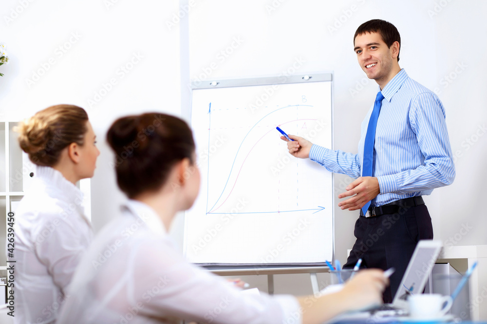 Young businessman in the office Young businessman in the office
