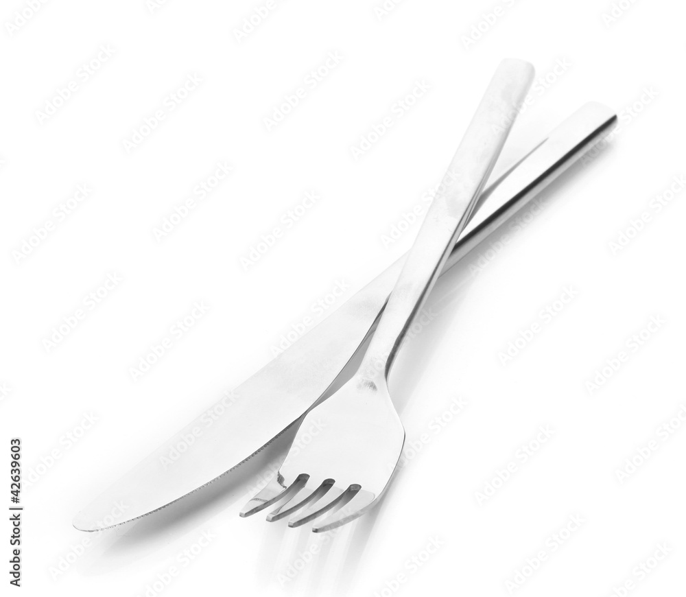 Silver fork and knife isolated on white Silver fork and knife isolated on white