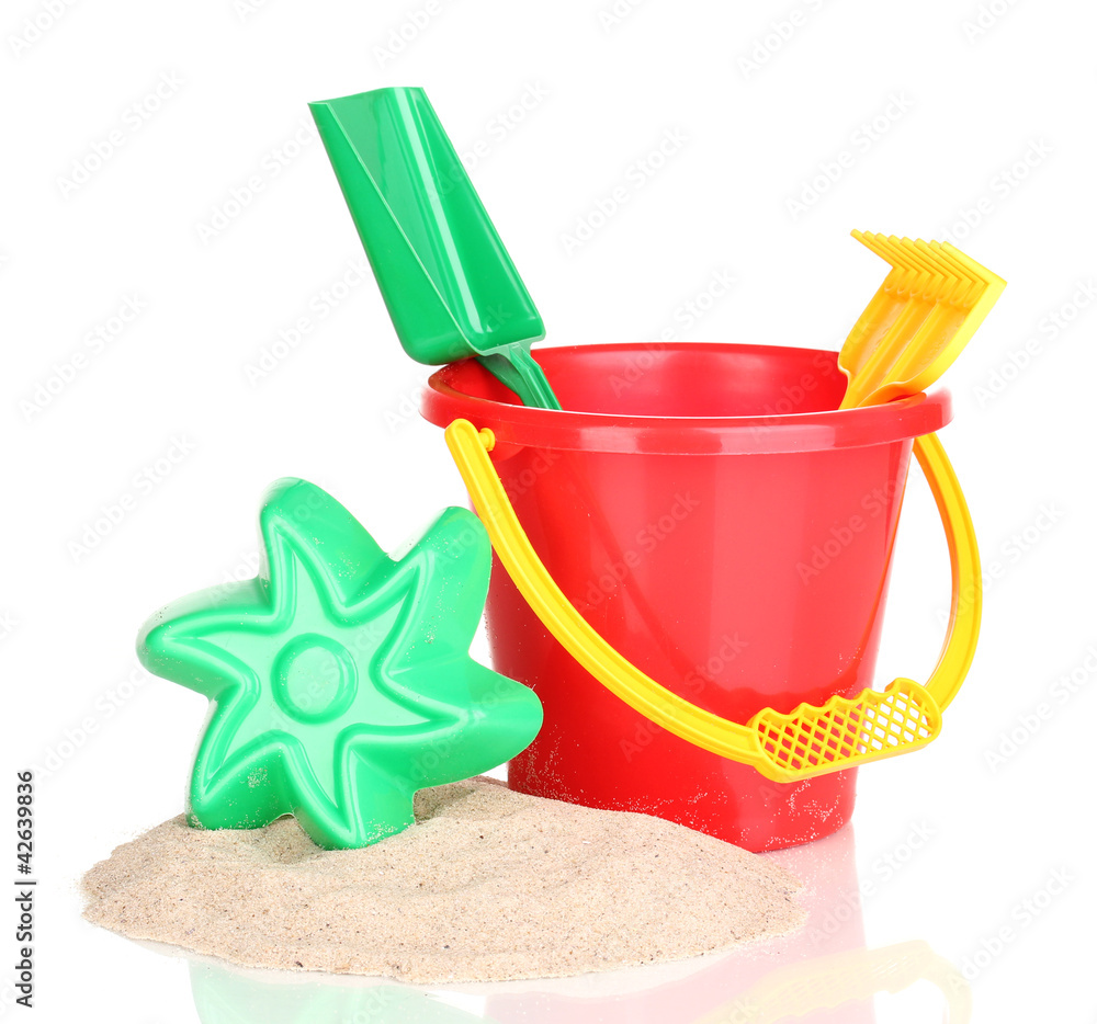 Children's beach toys and sand isolated on white Children's beach toys and sand isolated on white
