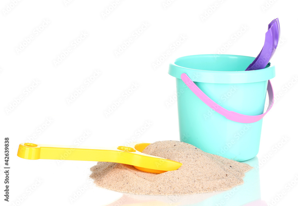 Children's beach toys and sand isolated on white Children's beach toys and sand isolated on white