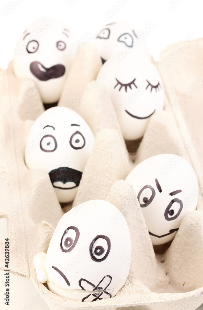 Obraz premium White eggs with funny faces