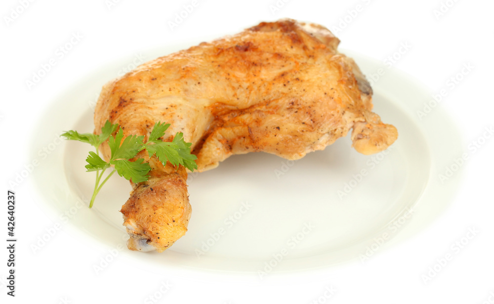 roasted chicken leg with parsley in the plate isolated on white roasted chicken leg with parsley in the plate isolated on white
