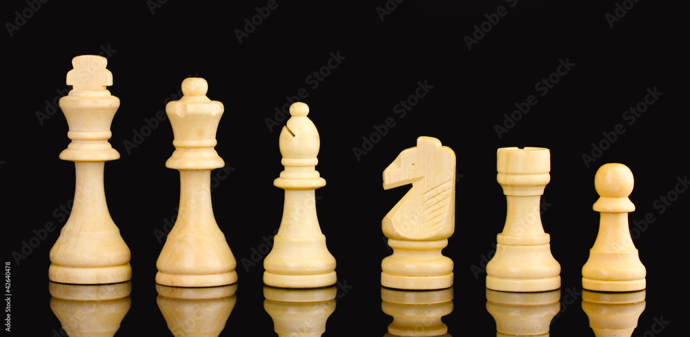 Chess pieces isolated on black Chess pieces isolated on black