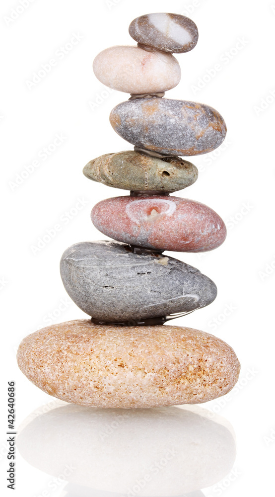 Stack of balanced stones isolated on white Stack of balanced stones isolated on white
