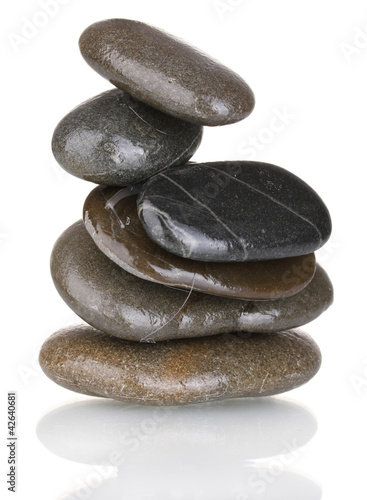 Stack of balanced stones isolated on white photo