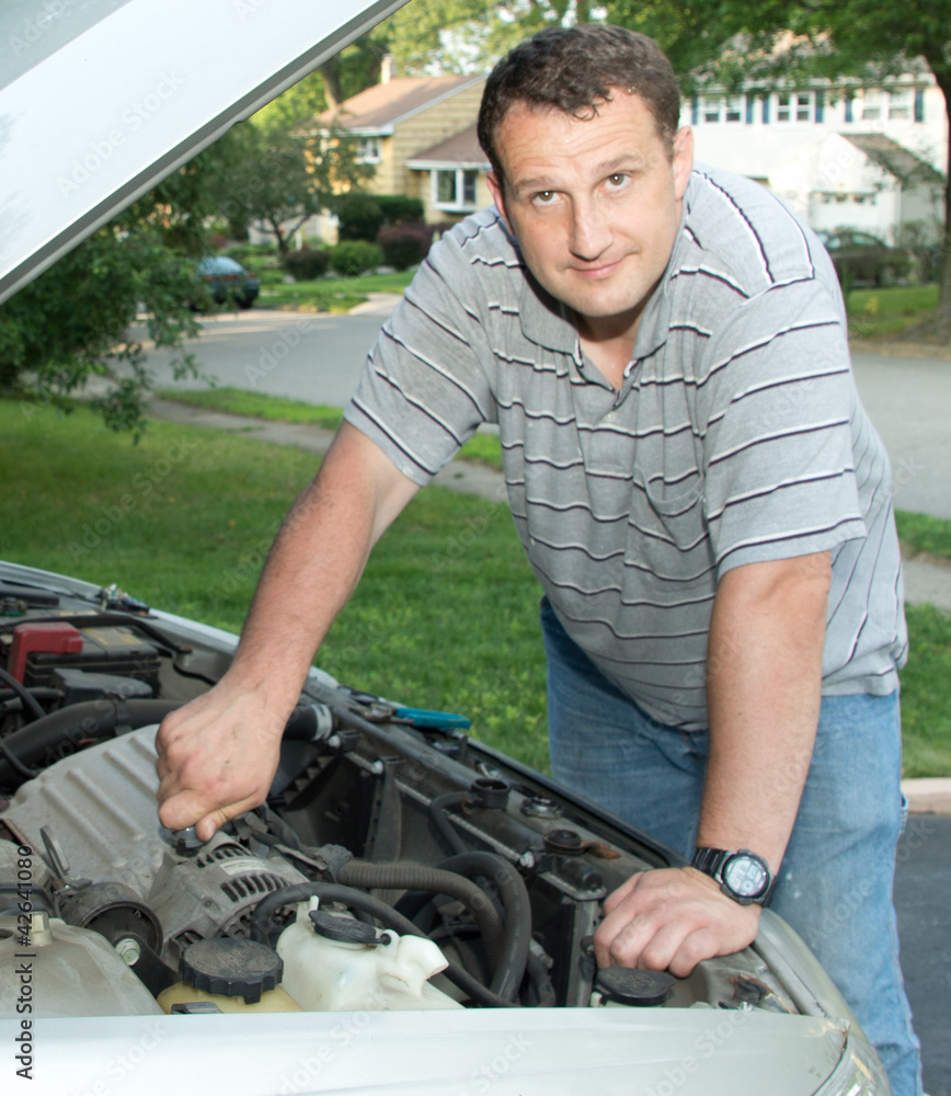 Mechanic fixing car Mechanic fixing car