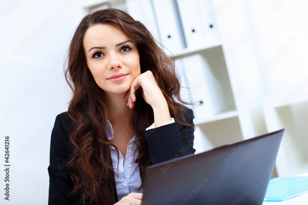 Young business woman with notebook Young business woman with notebook