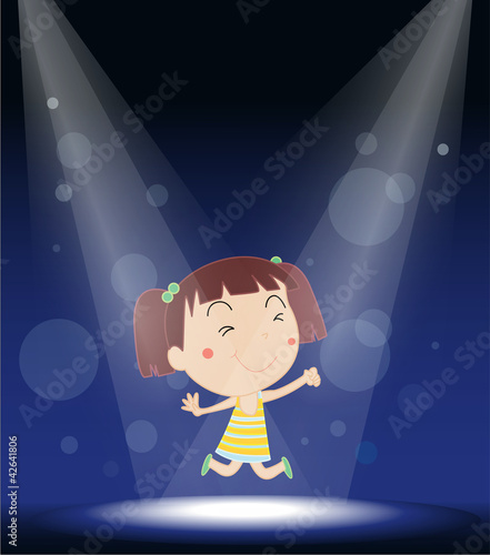 a girl performing on stage