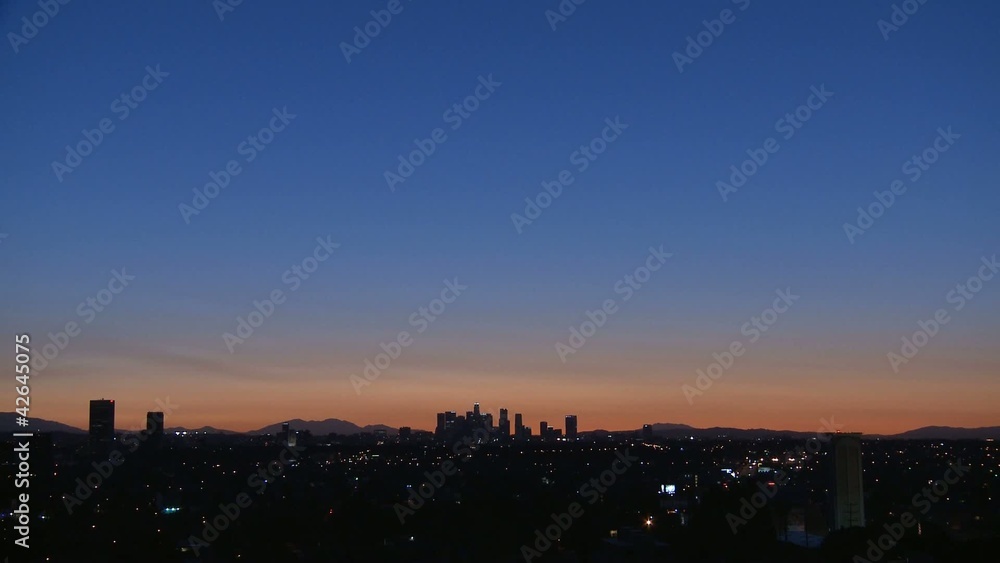 Sunrise of Downtown Los Angeles skyline with heat haze Sunrise of Downtown Los Angeles skyline with heat haze