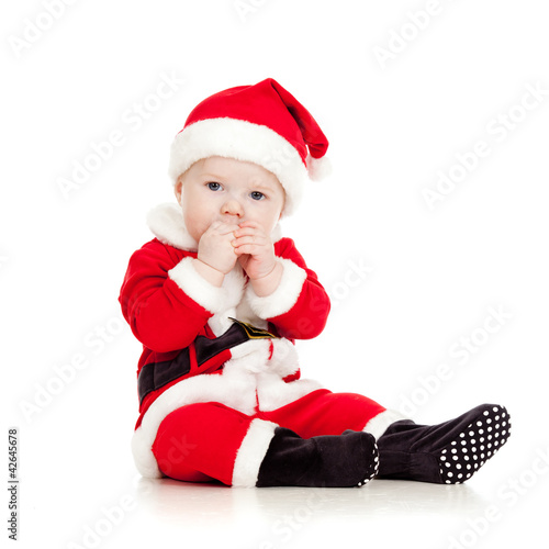 cute kid in Santa Claus clo...