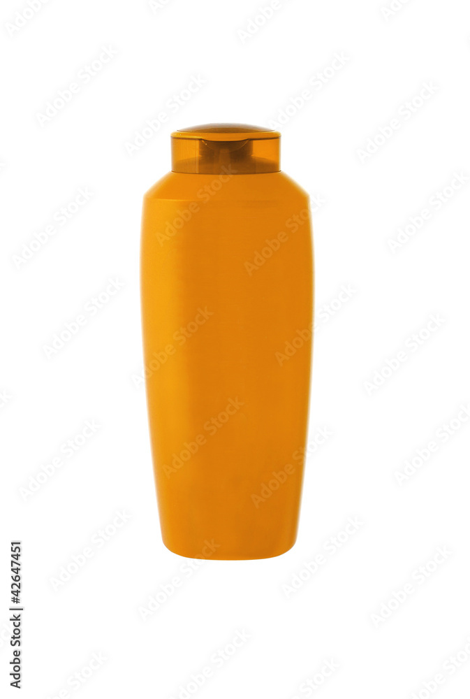 Orange shampoo bottle isolated on white