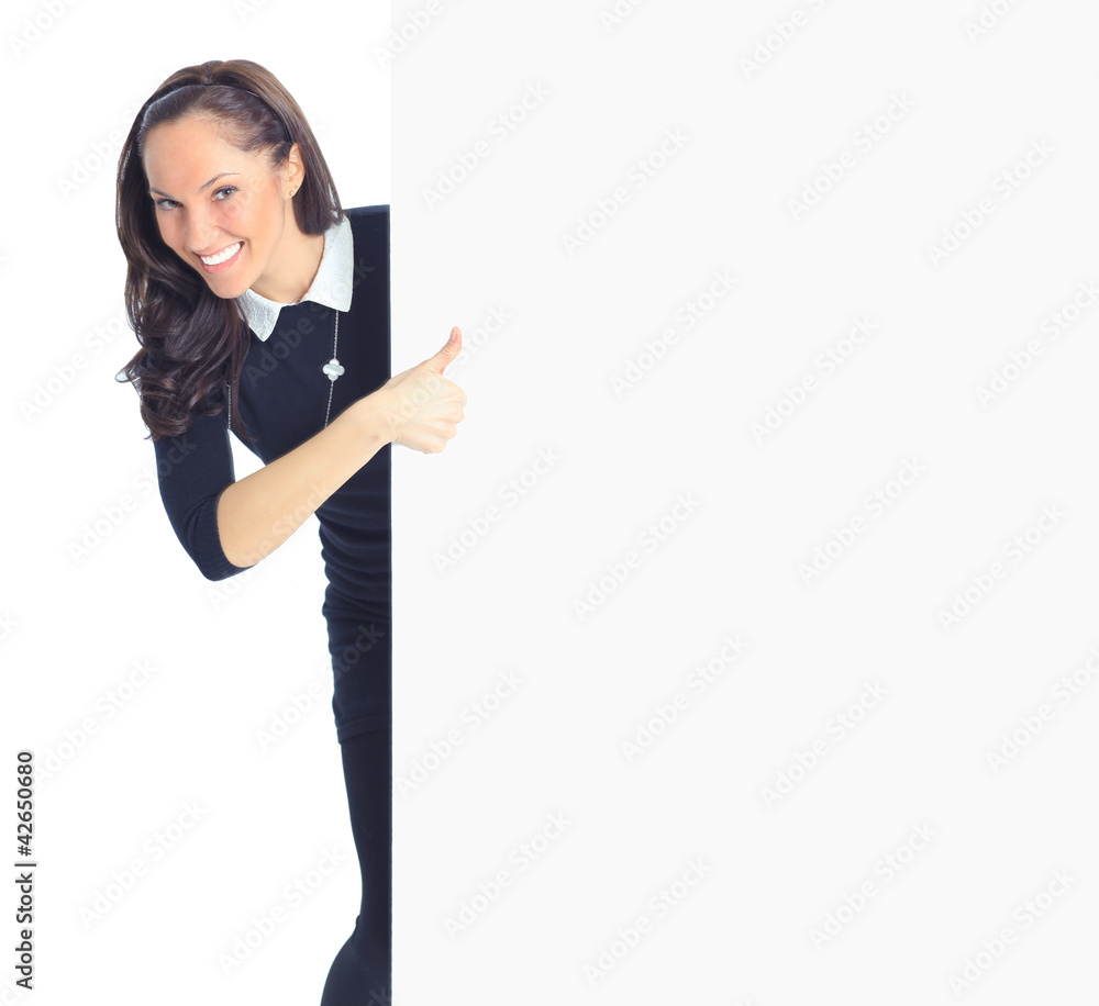 Smiling beautiful young business woman showing blank signboard Smiling beautiful young business woman showing blank signboard