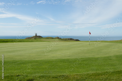 Coast golf green.