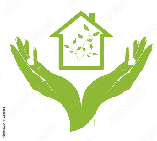 A symbol eco houses in female hands.