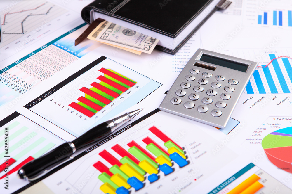 Financial papers on the table Financial papers on the table