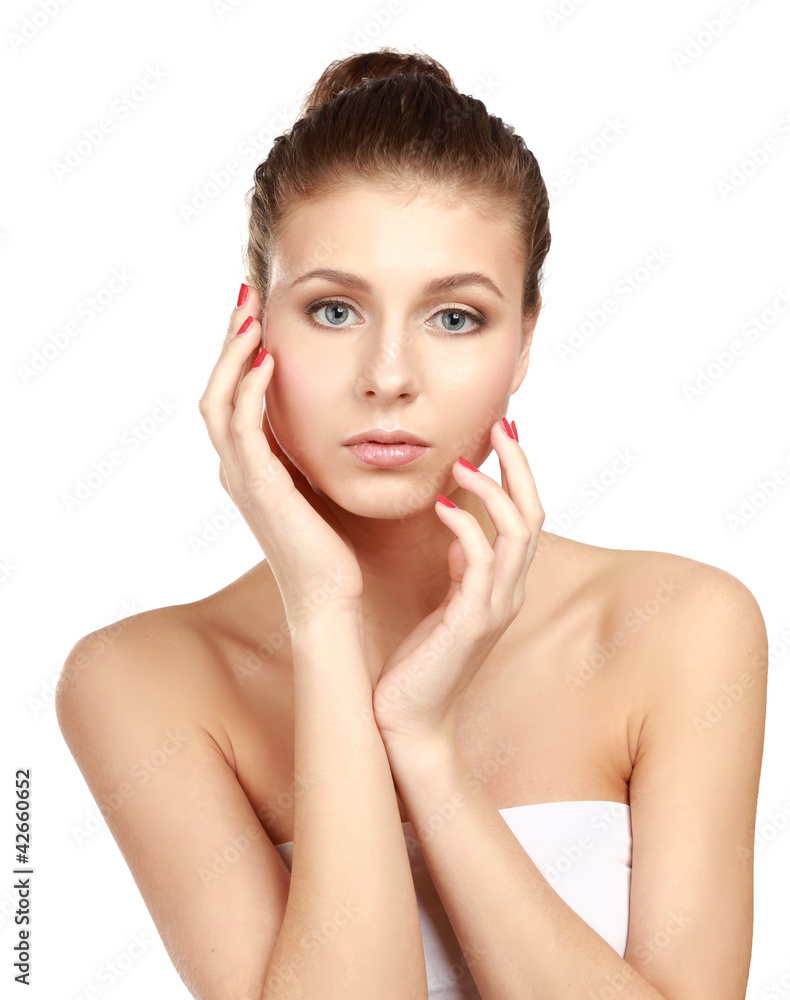 Young woman touching her face isolated on whire background Young woman touching her face isolated on whire background