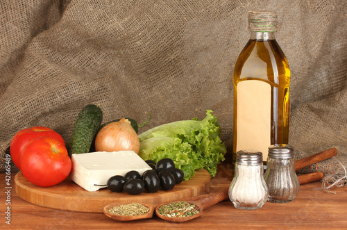 Fototapeta Naklejka Na Ścianę i Meble -  Ingredients for a Greek salad on canvas background close-up
