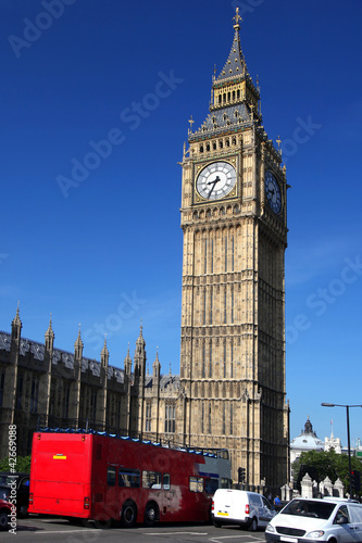 Big Ben with red city bus in London, UK