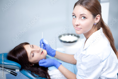 woman dentist working