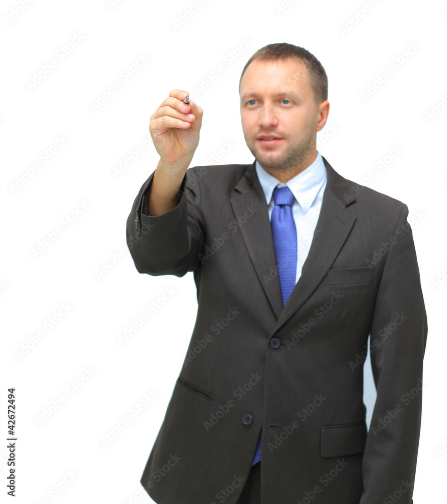 Businessman holds a marker and writes in air Businessman holds a marker and writes in air