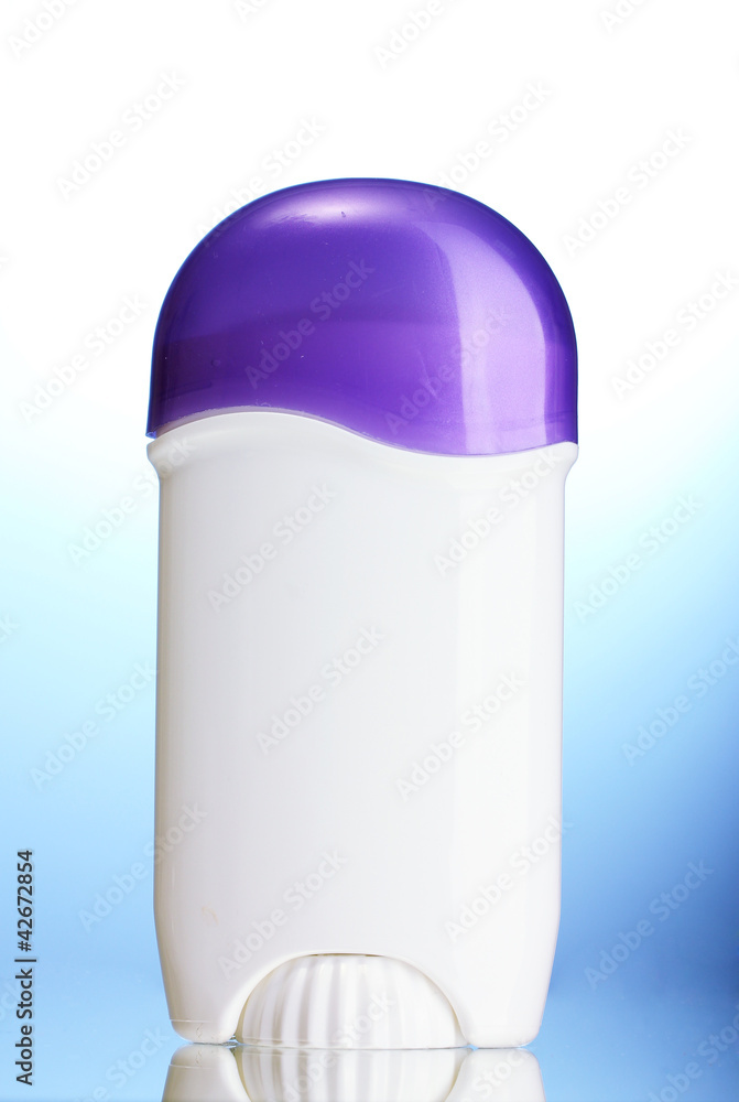 deodorant on blue background deodorant on blue background