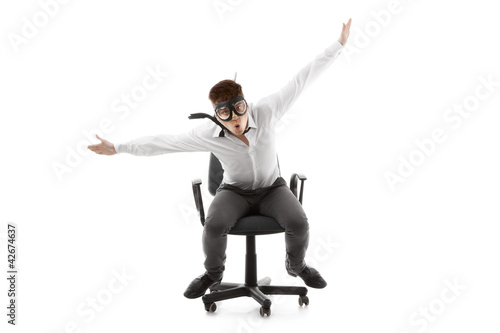 Funny young man on chair
