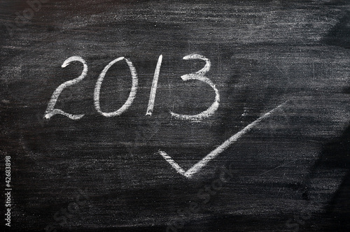 2013 written with chalk on a smudged blackboard