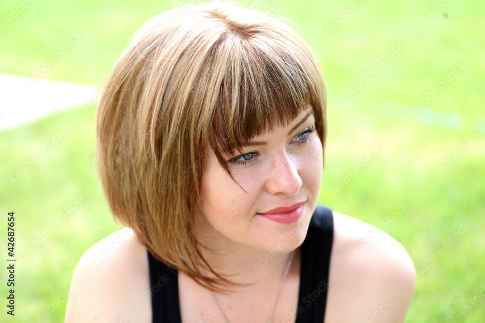 Closeup portrait of a happy young woman Closeup portrait of a happy young woman