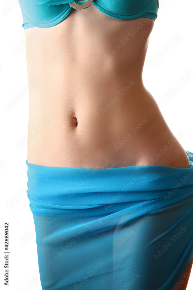 A slim female body isolated on white background A slim female body isolated on white background