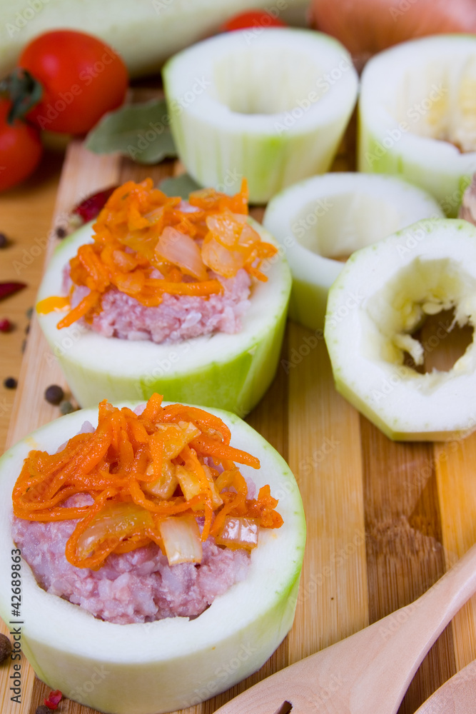 Raw zucchini stuffed with meat