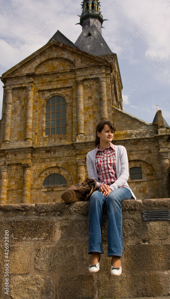 Young woman at Mont Saint Michel