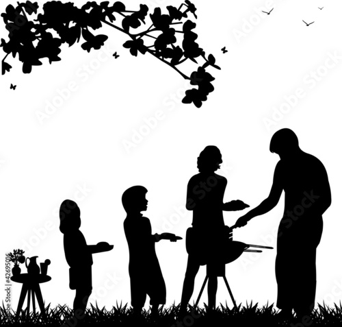 Family barbecue and picnic in the garden silhouette