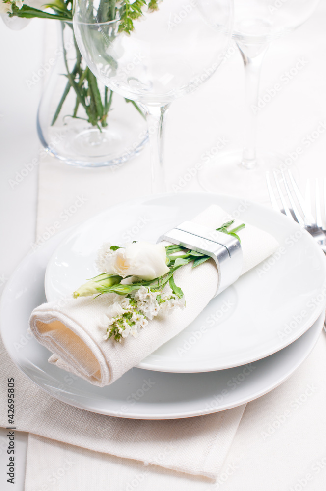 Festive table setting in white