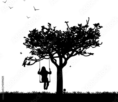 Girl on swing in park or garden silhouette
