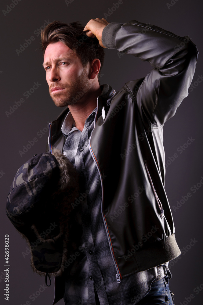 Fototapeta premium Handsome man in leather jacket