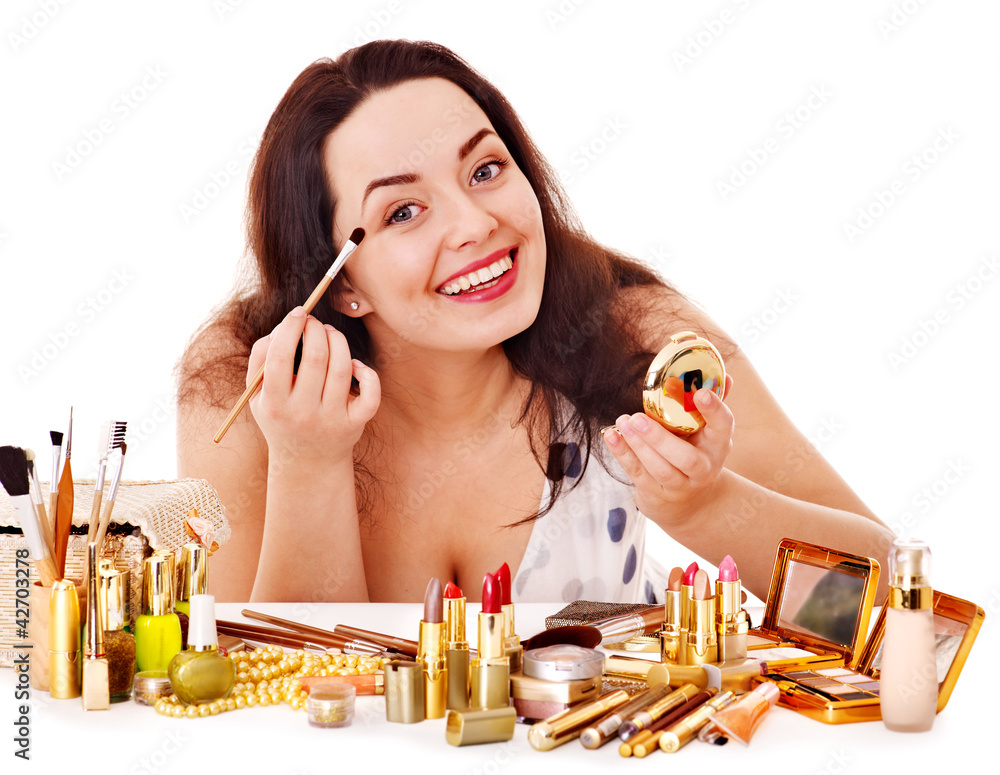 Fototapeta premium Girl applying makeup.