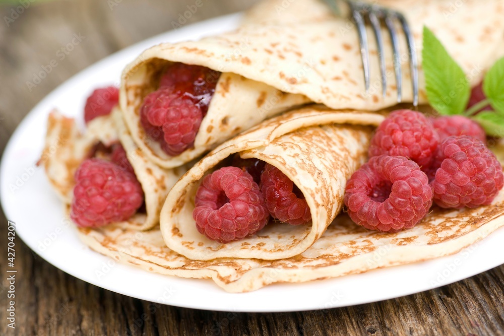 Crêpe mit Himbeeren Crêpe mit Himbeeren