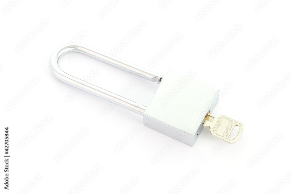 Silver padlock with key close on white background. Silver padlock with key close on white background.