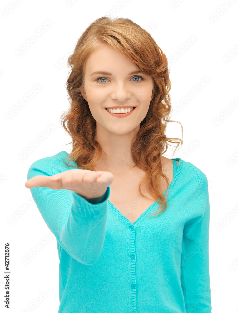 girl showing something on the palm of her hand girl showing something on the palm of her hand