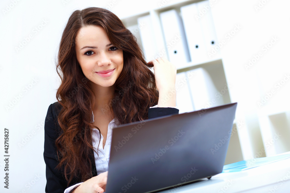 Young busines woman with notebook