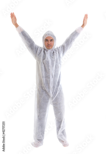 Man in white protective clothes with his hands raised up