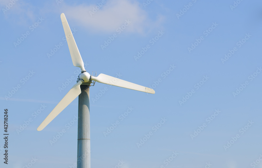 solitary wind turbine on a power generating farm solitary wind turbine on a power generating farm