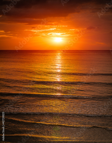 Sunrise in the sea with softwave and cloudy © moggara12