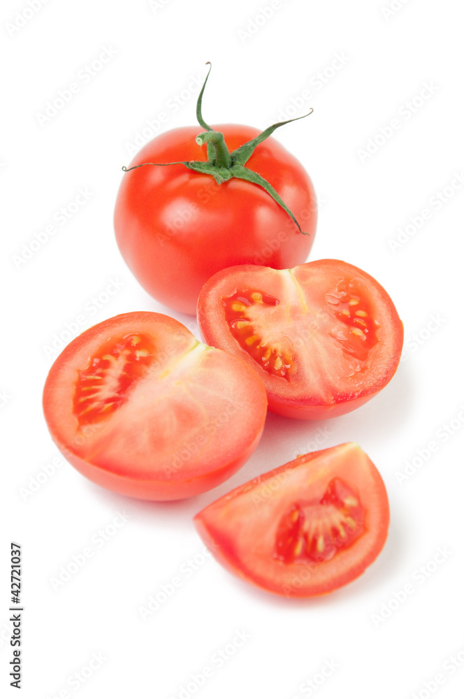 Close-up of fresh tomatoes, white background Close-up of fresh tomatoes, white background