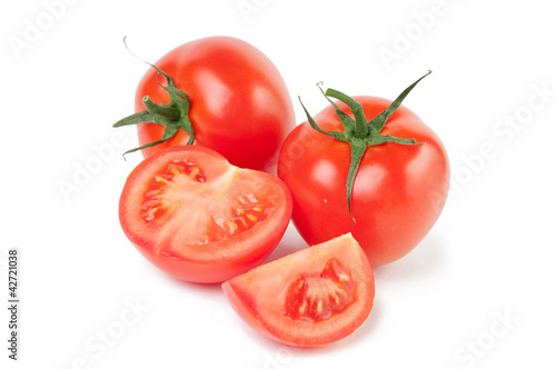 Studio shot of fresh and ripe tomatoes, white background