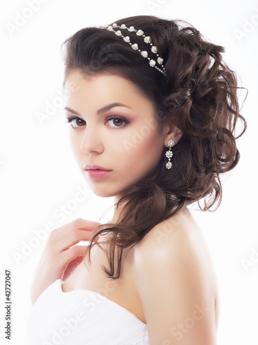 Portrait of beautiful young bride - isolated on white background