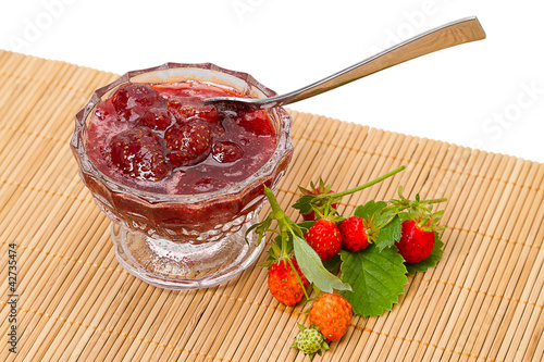 Jam and fresh strawberries photo