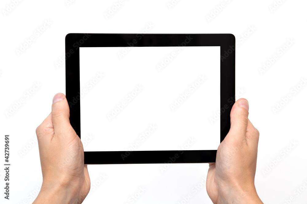 male hand holding a tablet