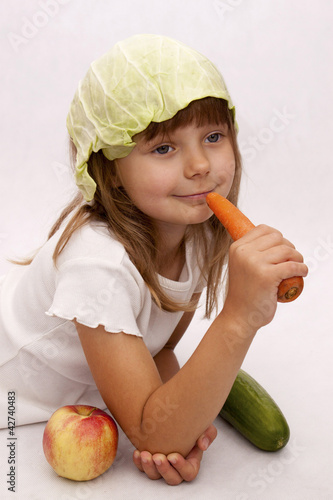 Dziecko z marchewką