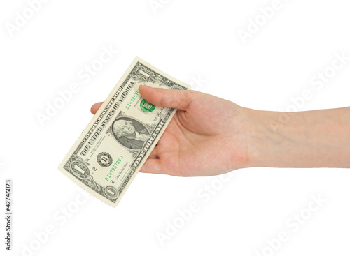 A man's hand holding a one dollar bill.